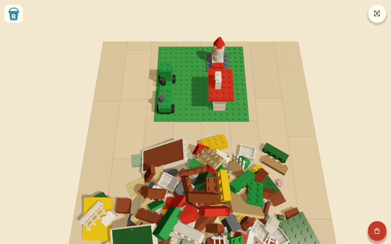 A green baseplate with a small tractor and a lighthouse, and a big jumbled pile of bricks, windows and fences on the floor below.